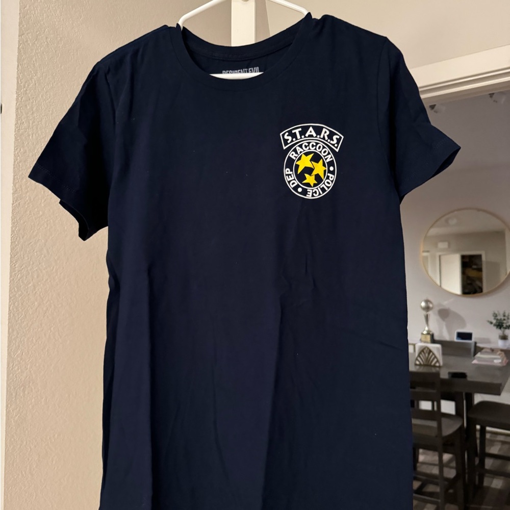 Resident Evil Mens T-Shirt- Raccoon Stars Label And Back Image